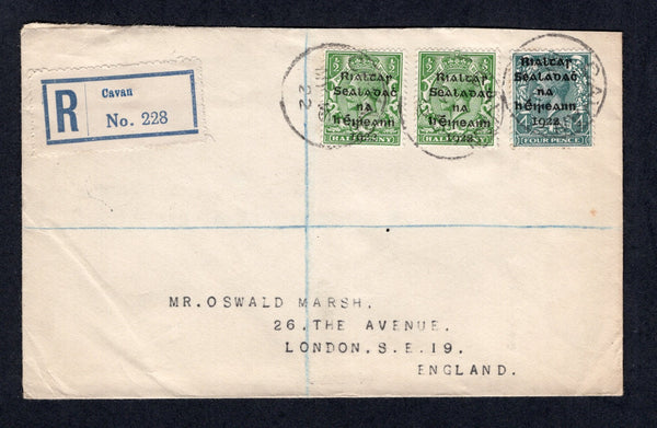 IRELAND - 1922 - PROVISIONAL ISSUE & REGISTRATION: Registered cover franked with 1922 2 x ½d green and 4d grey green GV issue with 'Provisional Government of Ireland 1922' first DOLLARD overprint in black (SG 1 & 6) tied by multiple strikes of CAVAN cds dated MAY 16 1922 with printed blue on white 'Cavan' registration label alongside. Addressed to UK with transit & arrival marks on reverse.  (IRE/33513)