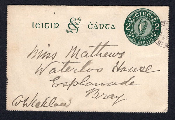 IRELAND - 1924 - POSTAL STATIONERY: 2d deep green on thick card 'Harp' postal stationery lettercard (FAI #K1b, H&G A1, outer perforations removed) used with BAILE ATHA CLIATH cds (Dublin) dated 22 SEP 1924 struck half off the card. Addressed to BRAY. Card a little creased but a scarce early used, the earliest recorded date being 19th Sept 1924.  (IRE/34386)