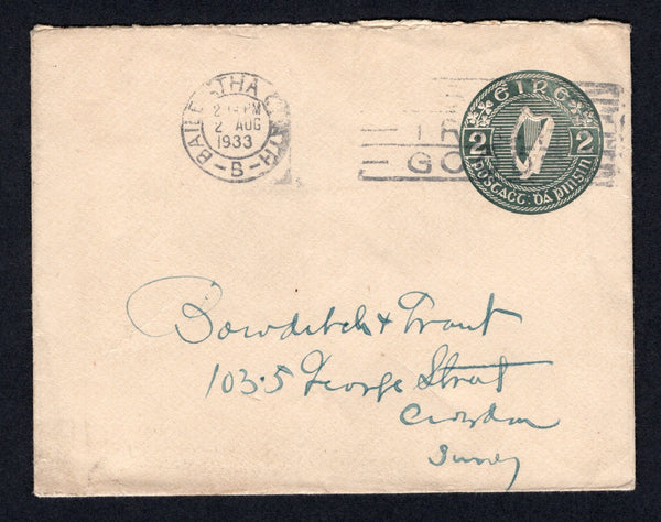 IRELAND - 1933 - POSTAL STATIONERY: 2d olive green 'Harp' postal stationery envelope (FAI #U1g, H&G B9) used with BAILE ATHA CLIATH roller cancel (Dublin) dated 2 AUG 1933. Addressed to UK.  (IRE/34389)