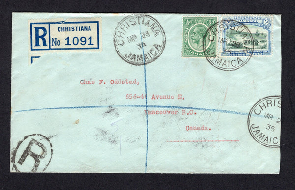 JAMAICA - 1936 - REGISTRATION & CANCELLATION: Registered cover franked with 1921 ½d green and 1921 3d myrtle green & blue GV issues (SG 92 & 99) tied by CHRISTIANA cds's with printed blue & white 'CHRISTIANA' registration label alongside. Addressed to CANADA with transit and arrival marks on reverse.  (JAM/20827)