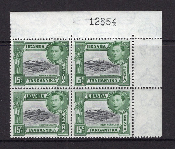 KENYA, UGANDA & TANGANYIKA - 1938 - MULTIPLE: 15c black & green GVI issue perf 13¾ x 13¼, a fine unmounted mint corner marginal block of four with '12654' sheet number handstamp in top margin. (SG 138)  (KUT/40237)