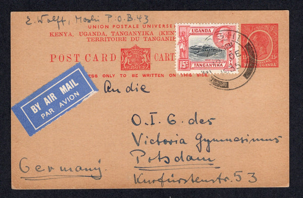 KENYA, UGANDA & TANGANYIKA - 1935 - POSTAL STATIONERY: 15c rose on buff GV postal stationery card (H&G 1) used with added 1935 15c black & scarlet GV issue (SG 113) tied by MOSHI cds dated 12 DEC 1935 with blue airmail label alongside. Sent airmail to GERMANY. Fine early use of this card.  (KUT/40439)
