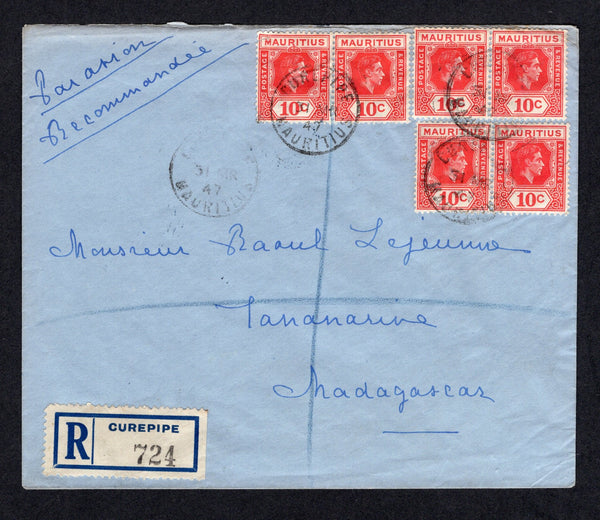 MAURITIUS - 1947 - FIRST FLIGHT: Registered cover franked with 1938 6 x 10c deep reddish rose GVI issue (SG 256c) tied by CUREPIPE cds's dated 31 MAR 1947 with printed blue on white 'CUREPIPE' registration label alongside. Flown on the 100th Mauritius - Reunion - Madagascar commemorative flight on the 1st April 1947 with boxed first flight cachet on reverse along with MADAGASCAR arrival cds. (Muller #5)  (MAU/40303)