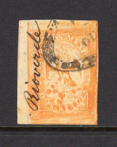 MEXICO - 1864 - EAGLE ISSUE: 2r orange 'First Period' EAGLE issue without district overprint issued to SAN LUIS POTOSI with 'RIOVERDE' sub district name added in manuscript reading up at left. A fine used copy with large margins and part oval cancel. A rare early use with the postmaster adding the district name in manuscript in line with the post office regulations, although it was not required at sub post offices. Only a single example is recorded by Frome. (SG 21, Follansbee #19)  (MEX/41206)