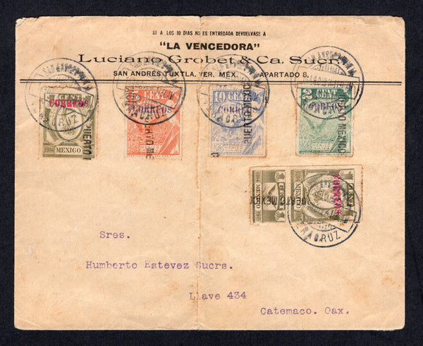 MEXICO - 1914 - CIVIL WAR FORGERY & POSTAL FISCALS: Printed 'La Vencedora Luciano Grobert & Ca. Sucr. San Andres Tuxtla, Ver, Mex' envelope franked with 1914 2c green, 5c orange and 10c ultramarine 'Documentary' REVENUE issue each stamp with 'CORREOS' overprint in purple and 'PUERTO MEXICO' district overprint and 1914 2 x 1c olive 'Renta Interior' REVENUE issue one with & one without coupon both overprinted 'CORREOS' in red with 'PUERTO MEXICO' district overprint (Stevens #DO452B, DO454B, DO455B, R405A & R