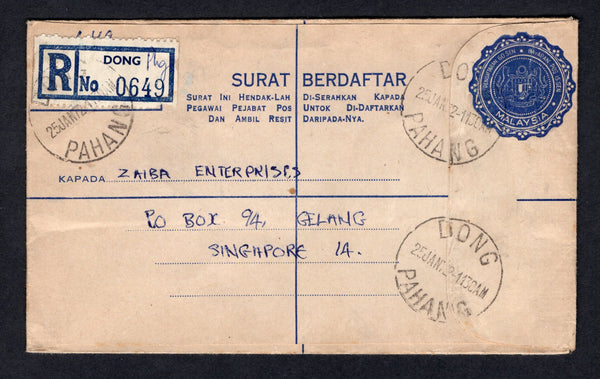 MALAYA - FEDERATION OF MALAYA - 1972 - POSTAL STATIONERY & CANCELLATION: 15s blue on buff postal stationery registered envelope (H&G Unlisted) used with fine DONG PAHANG cds's with printed blue & white 'DONG' registration label on front. Addressed to SINGAPORE with RAUB transit cds and SINGAPORE arrival cds on reverse.  (MYA/21272)