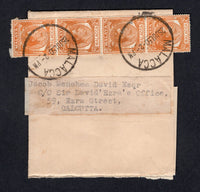 MALAYA - MALACCA - 1950 - RATE: Homemade newspaper wrapper franked with strip of four 1949 2c orange GVI issue (SG 4) tied by two fine strikes of MALACCA cds. Addressed to INDIA with arrival cds on reverse.  (MYA/21291)