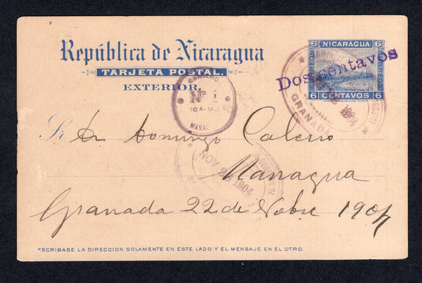 NICARAGUA - 1904 - POSTAL STATIONERY: 'Dos centavos' on 6c ultramarine 'Momotombo' postal stationery card (H&G 54b) used with oval GRANADA cancel. Addressed to MANAGUA with small circular 'CARTERO No.1 MANAGUA' marking and additional oval arrival mark all on front.  (NIC/10201)