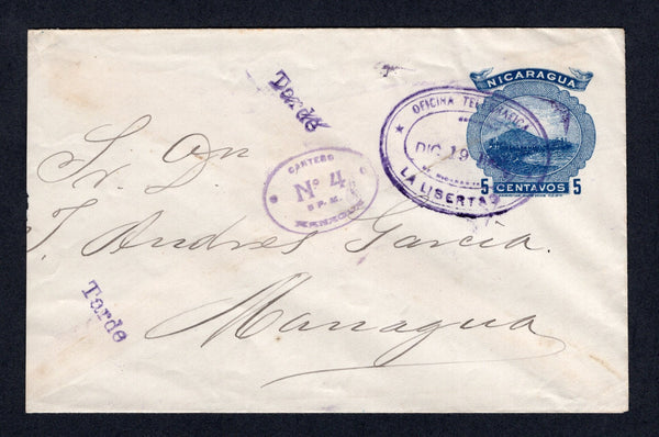NICARAGUA - 1904 - CANCELLATION: 5c blue 'Momotombo' postal stationery envelope (H&G B45) used with superb strike of OFICINA TELEGRAFICA DE LA LIBERTAD oval cancel dated DEC 19 1904. Addressed to MANAGUA with small oval CARTERO No. 4 - 5 P.M. MANAGUA marking and two strikes of small 'TARDE' marking on front and JUIGALPA oval transit mark on reverse. Trimmed approx 1cm at left but a scarce origination & cancel.  (NIC/14705)