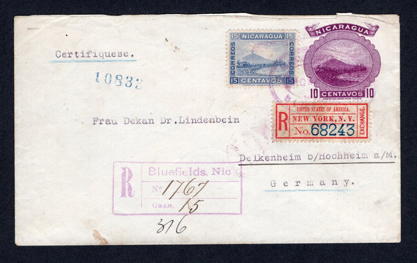 NICARAGUA - 1901 - POSTAL STATIONERY & REGISTRATION: 10c dull violet 'Momotombo' postal stationery envelope (H&G B41) used with added 1900 15c blue 'Momotombo' issue (SG 144) tied by oval BLUEFIELDS cancel with fine handstruck 'BLUEFIELDS NIC' registration marking alongside. Addressed to GERMANY with NEW YORK EXCHANGE registration label applied in transit plus various other transit and arrival marks on reverse. Very fine.  (NIC/19722)