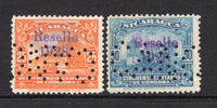 NICARAGUA - 1928 - PERFIN: 25c orange and 50c pale blue 'RESELLO 1928' overprint issue both stamps with large 'CANCELADO' PERFINS. Likely from a telegraph form. (SG 569/570)  (NIC/28641)