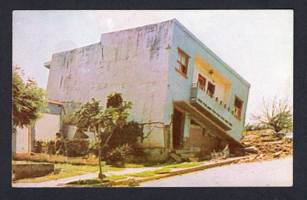 NICARAGUA - 1972 - EARTHQUAKE & POSTCARD: Colour PPC 'A residence that lost its gravity - December 1972 earthquake - Managua, Nicaragua' showing a house falling down. Fine unused.  (NIC/30431)