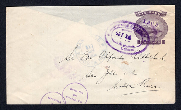 NICARAGUA - 1908 - POSTAL STATIONERY & PROVISIONAL ISSUES: 10c violet 'Momotombo' TRAIN postal stationery envelope with '1908' handstamp in deep violet (H&G B70) used with oval LEON cancel dated SEP 14 1908 with two strikes of circular 'OFICINA DE TRANSITO' marking in purple on front. Addressed to COSTA RICA with SAN JOSE arrival cds on front. Part of backflap missing but otherwise fine & scarce. The only recorded example of the envelope going to Costa Rica.  (NIC/39789)