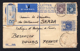 NIGERIA - 1939 - POSTAL STATIONERY, ROUTING & CANCELLATION: 3d blue GVI postal stationery registered envelope (H&G C4) used with added 1938 3d blue and 6d blackish purple GVI issue (SG 53 & 55) tied by oval REGISTERED ONDO cancels with blue & white registration label with 'ONDO' handstamp in violet alongside. Sent airmail to FRANCE with oval REGISTERED OSHOGBO and REGISTERED KHARTOUM (Sudan) transit marks and French arrival mark on reverse.  (NIG/21816)
