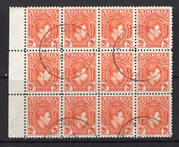 NIGERIA - 1938 - CANCELLATION & MULTIPLE: 2½d orange GVI issue, a superb used marginal block of twelve with multiple strikes of IKEJA CAMP P.O. skeleton cds dated 16 FEB 1946. (SG 52b)  (NIG/32701)