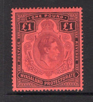 NYASALAND - 1938 - GVI ISSUE: £1 purple & black on red GVI issue, a fine mint copy. (SG 143)  (NYA/15005)