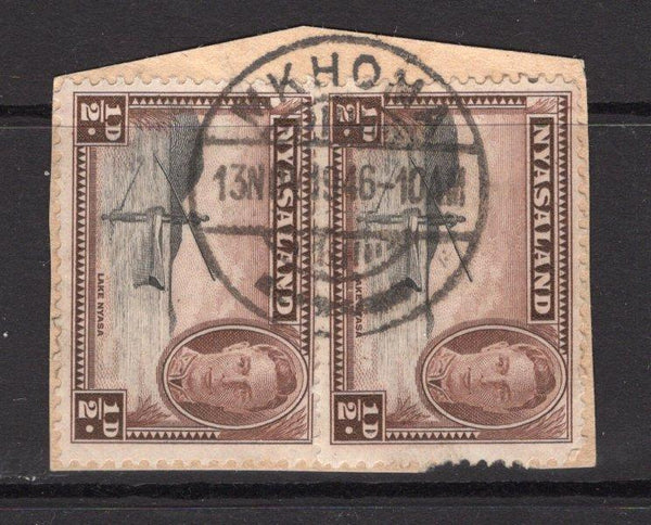 NYASALAND - 1945 - CANCELLATION: ½d black & chocolate GVI issue, a fine used pair on piece with complete strike of MKHOMA cds dated 13 NOV 1946. (SG 144)  (NYA/25961)