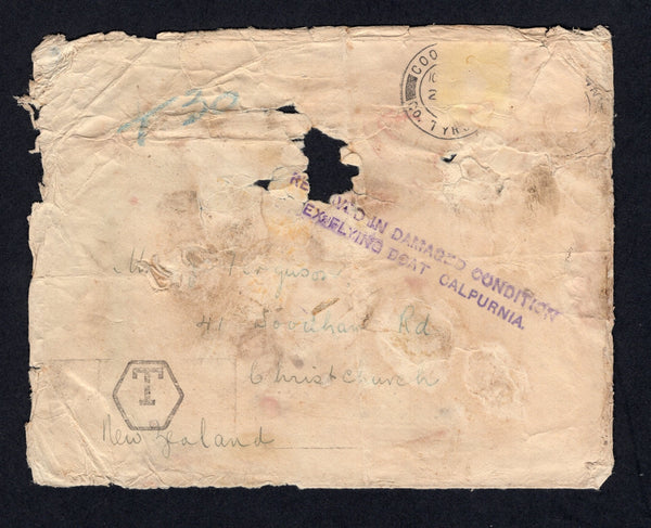 NEW ZEALAND - 1938 - CRASH MAIL: Badly damaged cover with stamp floated off due to water sent from Great Britain to Christchurch, New Zealand. Flown on the aircraft 'Calpurnia' which crashed on lake Ramadi in Iraq (near Habbaniyah) due to a sandstorm on the night of November 27th 1938.  The cover has a good strike of the two line RECEIVED IN DAMAGED CONDITION EX FLYING BOAT CALPURNIA cachet in purple on front and has been incorrectly marked for Postage Due on arrival in New Zealand with hexagonal 'T' and '