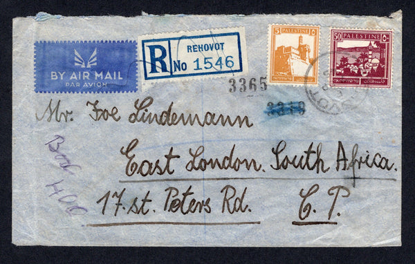 PALESTINE - 1945 - REGISTRATION & DESTINATION: Registered airmail cover franked with 1927 5m orange and 50m bright purple (SG 93 & 100a) tied by light REHOVOT cds with blue & white printed 'REHOVOT' registration label alongside. Addressed to SOUTH AFRICA with transit and arrival marks on reverse.  (PAL/21951)