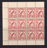 PAPUA NEW GUINEA - 1932 - BRITISH NEW GUINEA: 2/- dull lake 'Bird of Paradise' British New Guinea issue redrawn without dates, a fine unmounted mint marginal block of twelve comprising three rows of the sheet with sheet margins at top, bottom and left. (SG 186)  (PAP/39309)