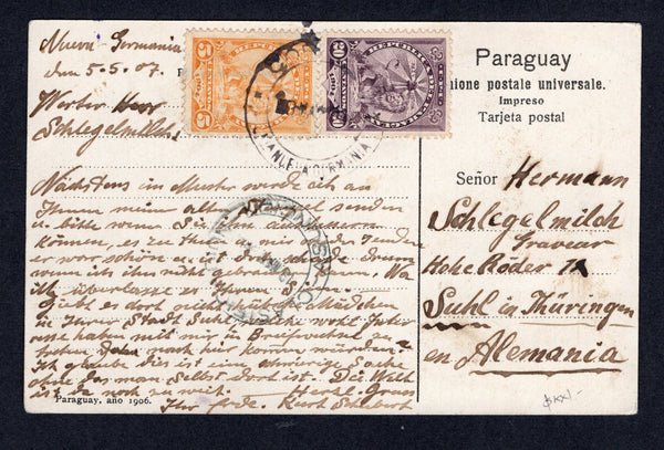 PARAGUAY - 1907 - POSTCARD & GERMAN COLONY: Colour PPC 'Salto Guaira Ladecones' showing waterfalls with small 'Kurt Schubert, Nueva Germania, Paraguay, Sudamer.' handstamp in violet on picture side franked on message side with 1905 5c yellow and 20c deep lilac LION issue (SG 116 & 120) tied by CORREOS CNIA NUEVA GERMANIA cds dated 5 MAY 1907. Addressed to GERMANY with ASUNCION transit cds on front.  (PAR/40122)