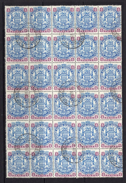 RHODESIA - 1896 - MULTIPLE: 4d blue & mauve 'Arms' issue 'Die 2', a superb used block of thirty with SALISBURY cds's dated 21 AUG 1897. A fine multiple. (SG 44a)  (RHO/17109)