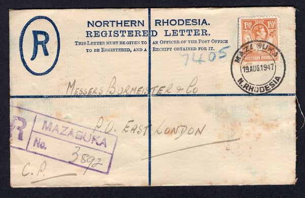 RHODESIA - NORTHERN RHODESIA - 1947 - POSTAL STATIONERY & CANCELLATION: 4d dull blue GVI postal stationery registered envelope (H&G C2) used with added 1938 1½d yellow brown GVI issue (SG 30) tied by fine MAZABUKA cds with fine strike of boxed 'MAZABUKA' registration marking alongside in violet. Addressed to SOUTH AFRICA with arrival cds on reverse.  (RHO/22159)