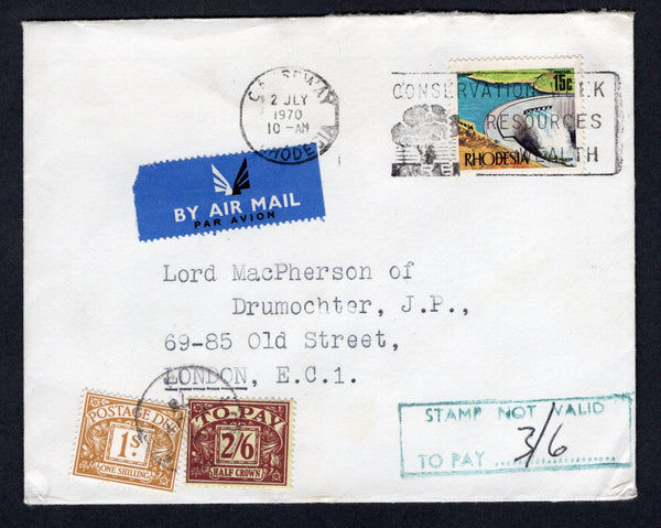 RHODESIA - 1970 - ILLEGAL USE: Cover franked with single 1970 15c 'Kariba Dam' QE2 issue (SG 447) tied by SALISBURY machine cancel. Addressed to UK with boxed 'STAMP NOT VALID TO PAY 3/6' cachet in green on front with added Great Britain 1959 1/- ochre & 2/6 purple on yellow 'Postage Due' issue (SG D64/D65) tied by LONDON cds. Nice red on white 'Southern Rhodesia Stamps. The government has announced that the stamps issued in Rhodesia of the kind used on this postal packet have no legal basis. The packet is
