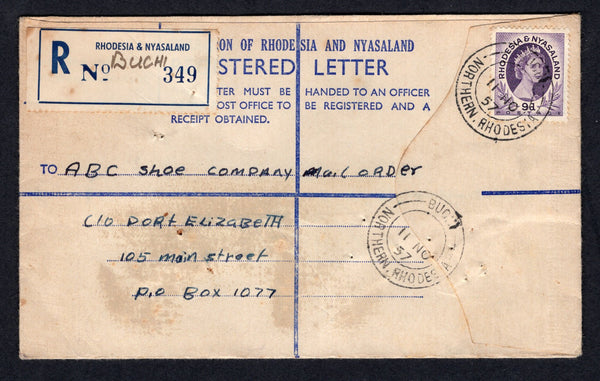RHODESIA - RHODESIA & NYASALAND - 1957 - CANCELLATION & REGISTRATION: Printed 'Federation of Rhodesia & Nyasaland' formular registered envelope franked with single 1954 9d violet QE2 issue (SG 8) tied by BUCHI cds with fine second strike alongside and printed 'RHODESIA & NYASALAND' registration label with manuscript 'Buchi' on front. Addressed to PORT ELIZABETH.  (RHO/37181)
