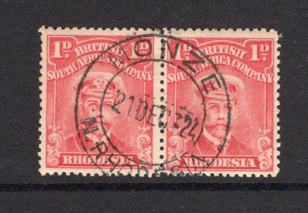 RHODESIA - 1922 - CANCELLATION: 1d aniline red 'Admiral' issue on toned paper, perf 14, a fine used pair with complete strike of MONZE N. RHODESIA cds dated 21 DEC 1924. (SG 286)  (RHO/40891)