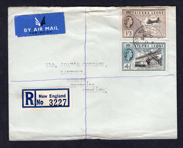 SIERRA LEONE - 1956 - REGISTRATION & CANCELLATION: Registered cover franked with 1956 4d black & slate blue and 1/3 black & sepia QE2 issue (SG 215 & 218) tied by NEW ENGLAND cds with printed blue & white 'NEW ENGLAND' registration label alongside. Sent airmail to UK with transit mark on reverse.  (SIE/22330)