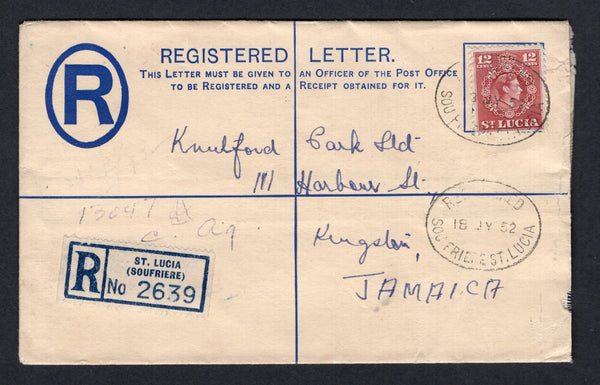 SAINT LUCIA - 1952 - POSTAL STATIONERY & CANCELLATION: 6c ultramarine on cream GVI postal stationery registered envelope (H&G C7, size G) used with added 1949 12c claret GVI issue (SG 153) tied by oval REGISTERED SOUFRIERE cancels dated 18 JUL 1952 with blue & white printed 'St. LUCIA (SOUFRIERE)' registration label alongside. Addressed to JAMAICA with arrival cds on reverse.  (STL/30912)