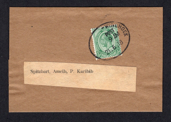 SOUTH WEST AFRICA - 1918 - SOUTH AFRICA USED IN SOUTH WEST AFRICA: Homemade newspaper wrapper franked with single South Africa 1913 ½d green GV Head issue (SG 3) tied by fine oval WINDHOEK cancel (adapted from the German South West Africa TPO mark). Addressed to KARIBIB.  (SWA/22516)