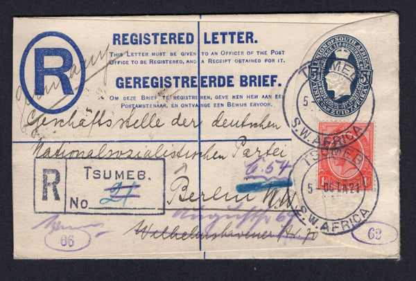 SOUTH WEST AFRICA - 1921 - SOUTH AFRICA USED IN SOUTH WEST AFRICA, POSTAL STATIONERY & CANCELLATION: 5½d deep blue on cream GV postal stationery registered envelope of South Africa (H&G C4) used with added 1913 1d carmine red GV Head issue of South Africa (SG 4a) tied by two fine strikes of large TSUMEB cds dated 5 OCT 1921 with boxed 'TSUMEB' registration marking alongside. Addressed to GERMANY with various transit & arrival marks on reverse. Fine & scarce.  (SWA/36467)