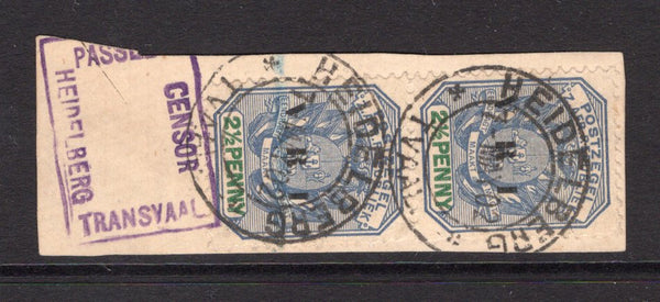 TRANSVAAL - 1902 - CANCELLATION: 2½d dull blue & green with 'V.R.I.' overprint, a fine pair used on piece with two strikes of HEIDELBERG cds dated 7 MAY 1902 and small boxed 'PASSED CENSOR HEIDELBERG TRANSVAAL 'Boer War' marking in purple. (SG 229)  (TRA/13549)