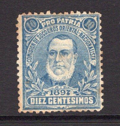 URUGUAY - 1897 - REVOLUTIONARY ISSUES: 10c blue 'Figueroa' Pro Patria NATIONALIST stamp issue produced during the revolution of 1897 inscribed 'Comision de Socorros Oriental Nacionalista' and dated 1897. Perforated & mint with gum with part strike of oval 'COMISION DE SOCORROS ORIENTAL NATIONALISTA URUGUAY STA FE' control cachet in blue on gum. A couple of light gum tones but very rare. (See note and illustrations in 'The Postage Stamps of Uruguay' by E.J. Lee, page 176)  (URU/26117)