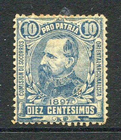 URUGUAY - 1897 - REVOLUTIONARY ISSUES: 10c blue 'Maximo Santos' Pro Patria NATIONALIST stamp issue produced during the revolution of 1897 inscribed 'Comision de Socorros Oriental Nacionalista' and dated 1897. Perforated & mint with gum with part strike of oval 'COMISION DE SOCORROS ORIENTAL NATIONALISTA URUGUAY STA FE' control cachet in blue on gum. A couple of light gum tones but very rare. (See note and illustrations in 'The Postage Stamps of Uruguay' by E.J. Lee, page 176)  (URU/26118)