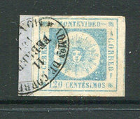 URUGUAY - 1859 - CLASSIC ISSUES: 120c pale blue 'Montevideo' SUN issue, thin figures of value, a fine used copy tied on small piece by oval MONTEVIDEO cancel in black, four margins. (SG 11a)  (URU/30930)