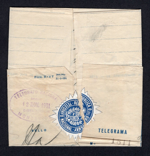 URUGUAY - 1931 - TELEGRAM: Printed 'TELEGRAFO NACIONAL' Telegram form used from MONTEVIDEO to BUENOS AIRES, ARGENTINA, folded with blue & white 'Starburst' TELEGRAPH SEAL (Ciardi #COT4) tied by oval 'TELEGRAFO NACIONAL DISTRIBUCION MONTEVIDEO' cancel in purple dated 12 NOV 1931. The seal has been split from opening as is usual with these forms but still an attractive item.  (URU/39537)