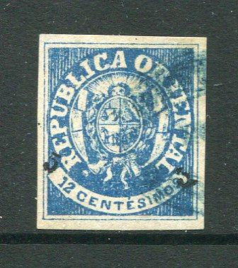 URUGUAY - 1866 - PROVISIONALS: 5c on 12c blue 'Arms' PROVISIONAL SURCHARGE issue a fine lightly used copy with four good margins. (SG 24)  (URU/5533)
