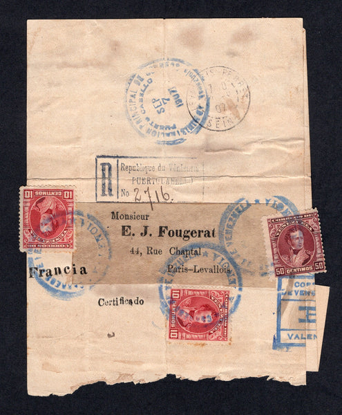 VENEZUELA - 1907 - REGISTRATION & RATE: Registered newspaper wrapper franked with 1904 2 x 10c carmine & 50c claret (SG 312 & 315) tied by undated VALENCIA cancels in blue with part strike of CORREOS VDE VENEZUELA 'R' VALENCIA registration marking in blue. Addressed to FRANCE with PUERTO CABELLO transit cds on reverse and boxed 'PUERTO CABELLO' registration marking in black struck in transit. French arrival cds on reverse. Opens well for display. Rare rate.  (VEN/10913)