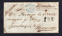 VENEZUELA - 1863 - TRANSATLANTIC MAIL: Stampless folded letter datelined 'La Guayra' with fine strike of CORREOS LA GUAIRA cds dated JUL 23 on front. Addressed to TENERIFE, CANARY ISLANDS with handstruck '12RS' rate marking on front and LONDON transit cds on reverse. Cover a little worn in places but otherwise attractive. This cover was likely to have sailed by Spanish ship via UK to its destination.  (VEN/27211)