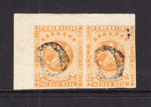 VENEZUELA - 1863 - CLASSIC ISSUES: ½r yellow 'Eagle' issue, a fine corner marginal pair with margins all round used with two complete strikes of '0' rate marking in black, one on each stamp. A scarce issue in multiples. (SG 18)  (VEN/31471)